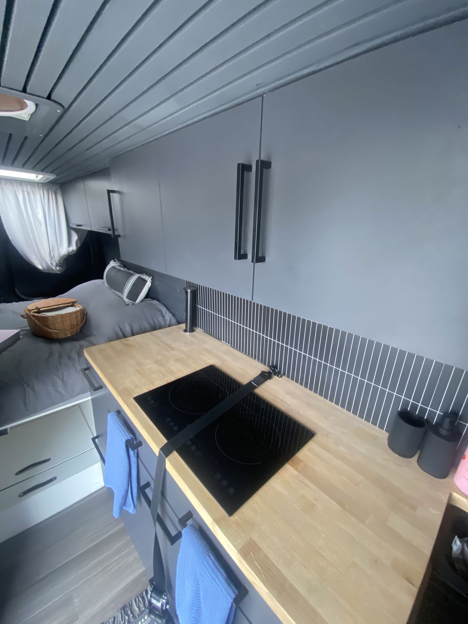 Off Grid Ready Luxury Camper Van for Rent or Lease Equipped with AC, 700AH Battery Bank, Convertible Bed, Fridge Freezer, Electric Stovetop - Image 6